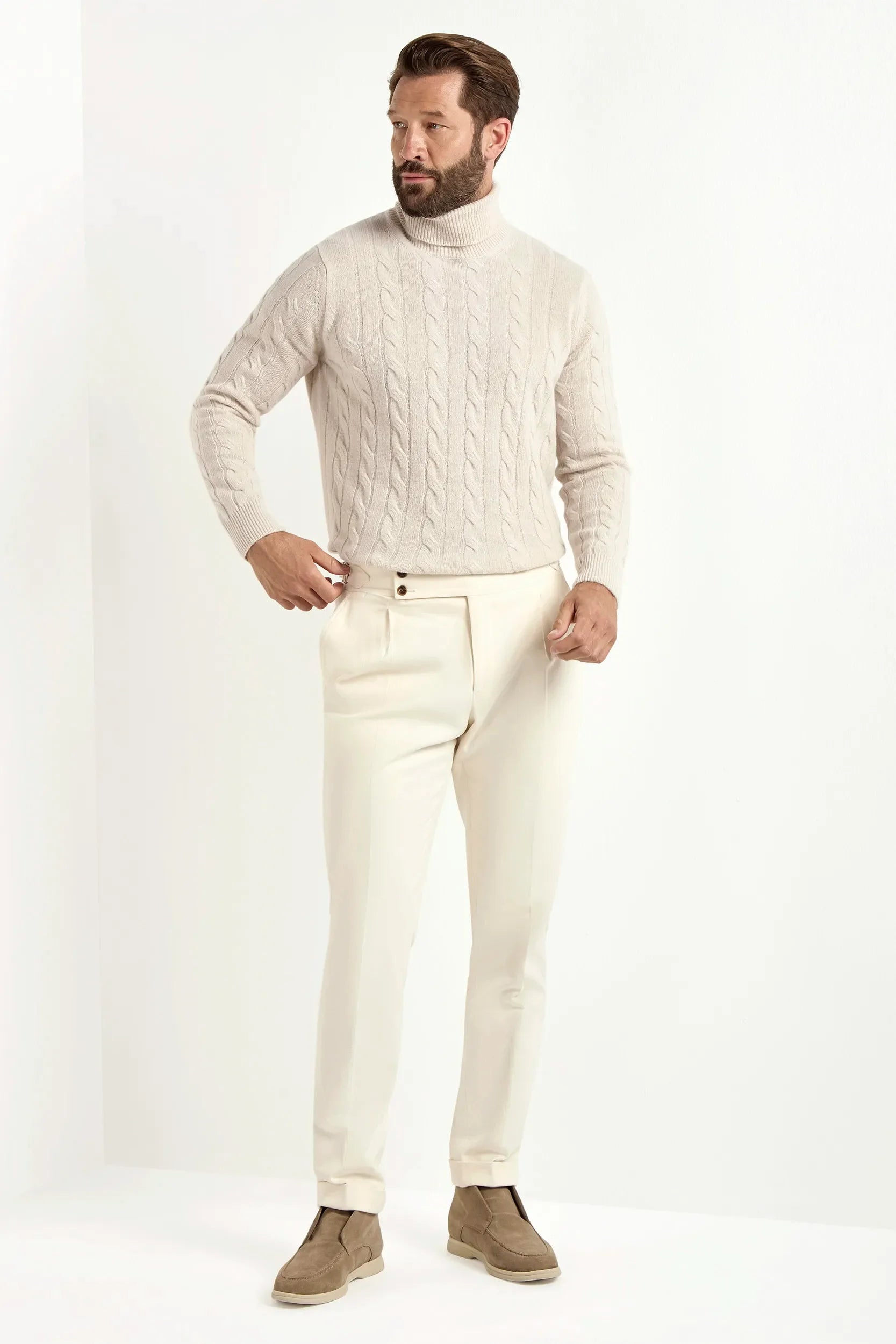 Beige cable-knit turtleneck sweater