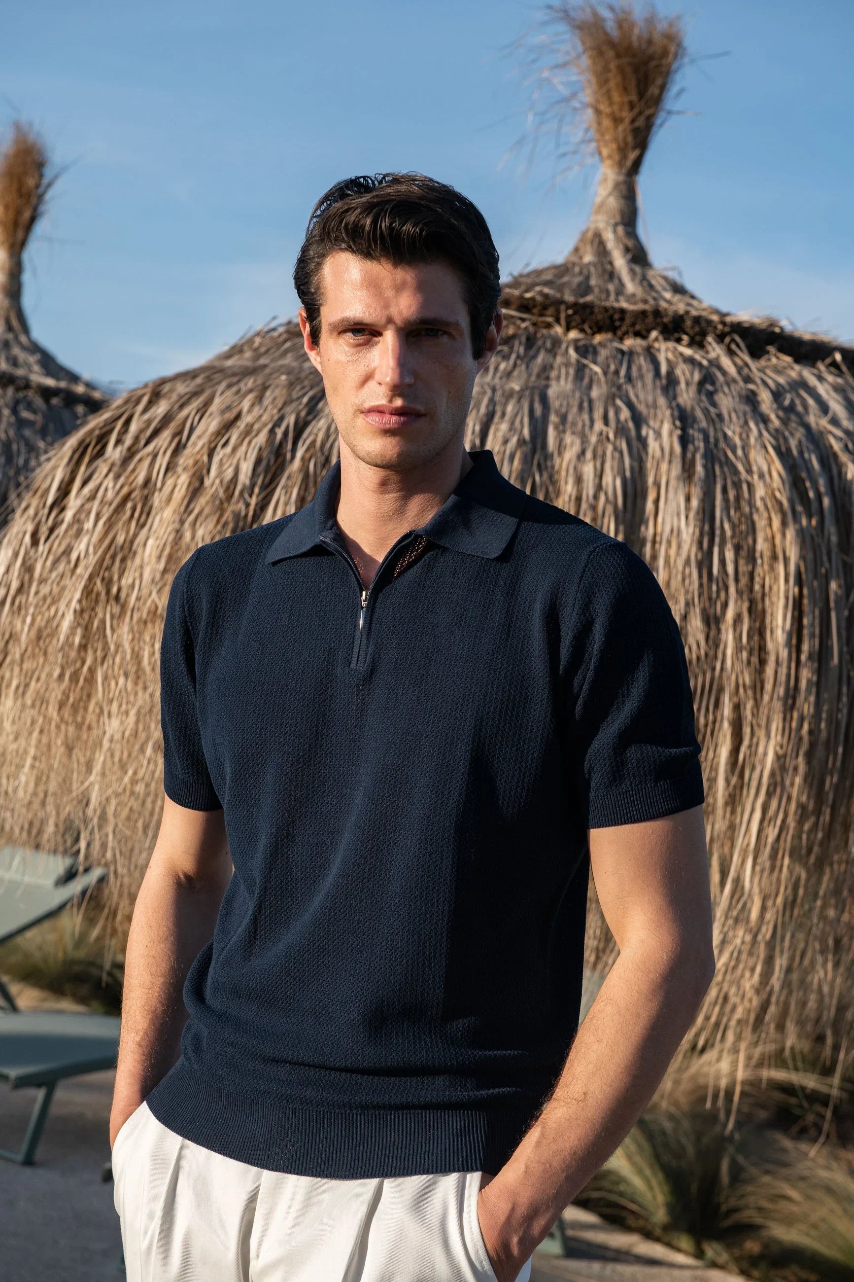Polo shirt in blue textured knit with zip