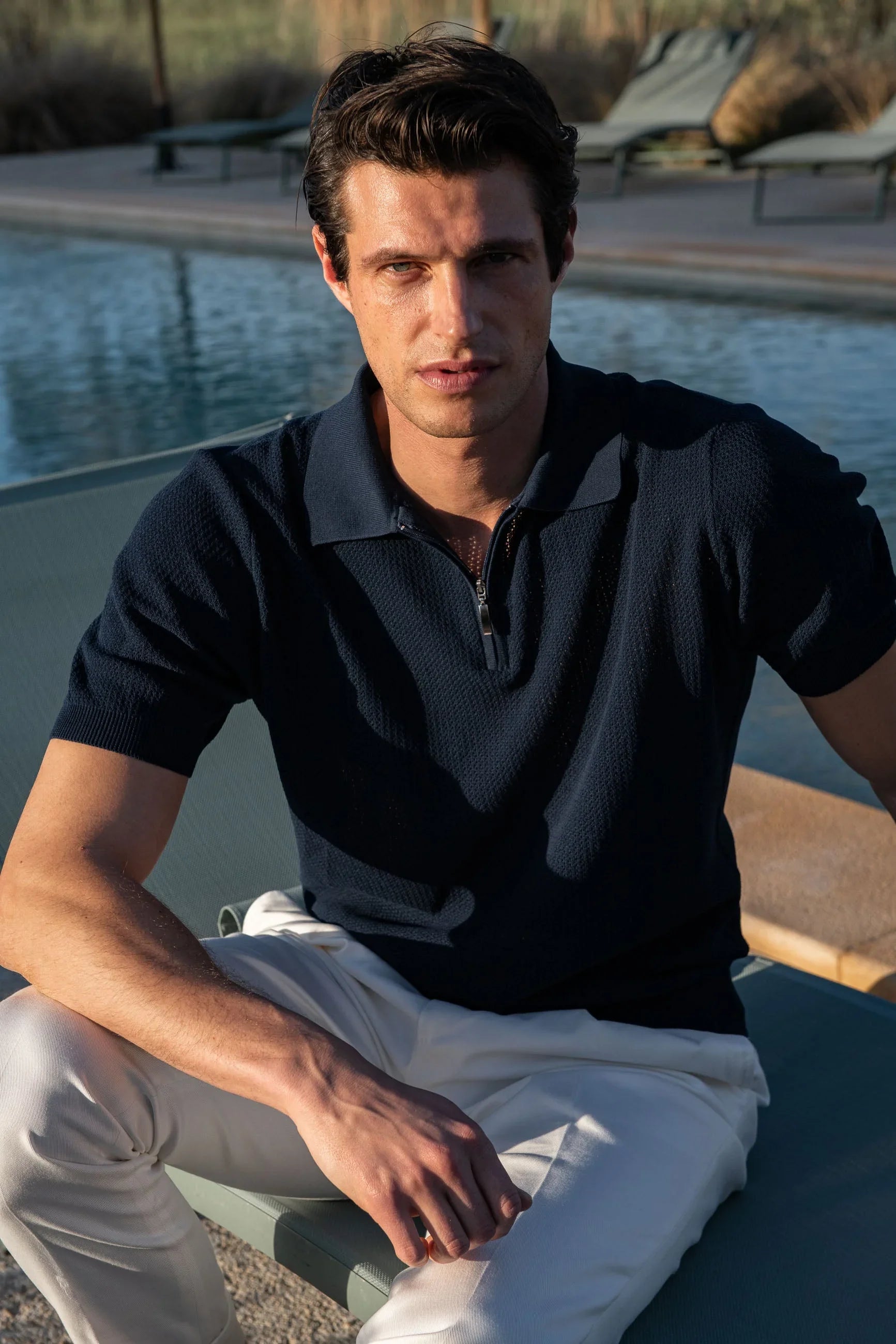 Polo shirt in blue textured knit with zip