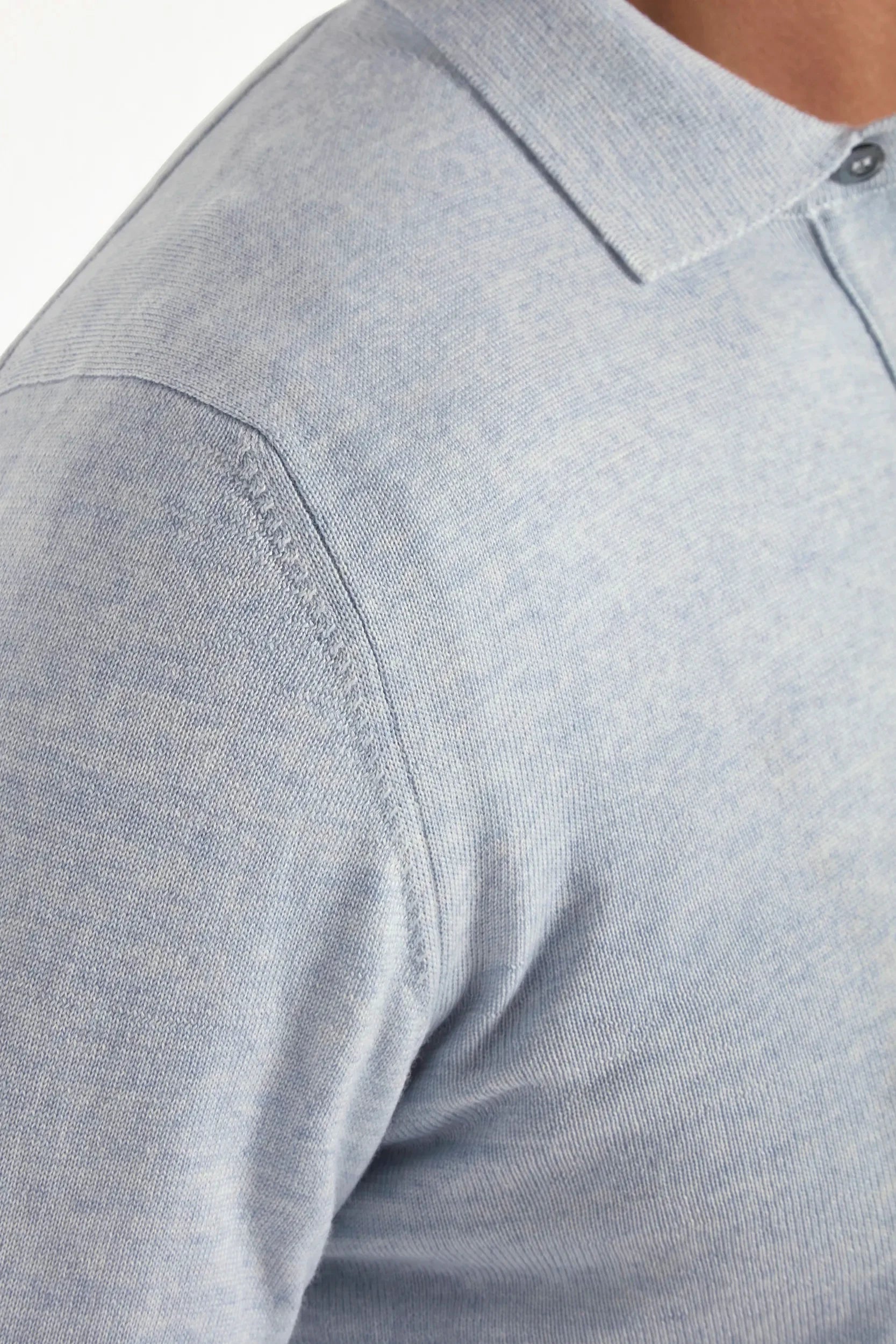 Light blue merino polo shirt