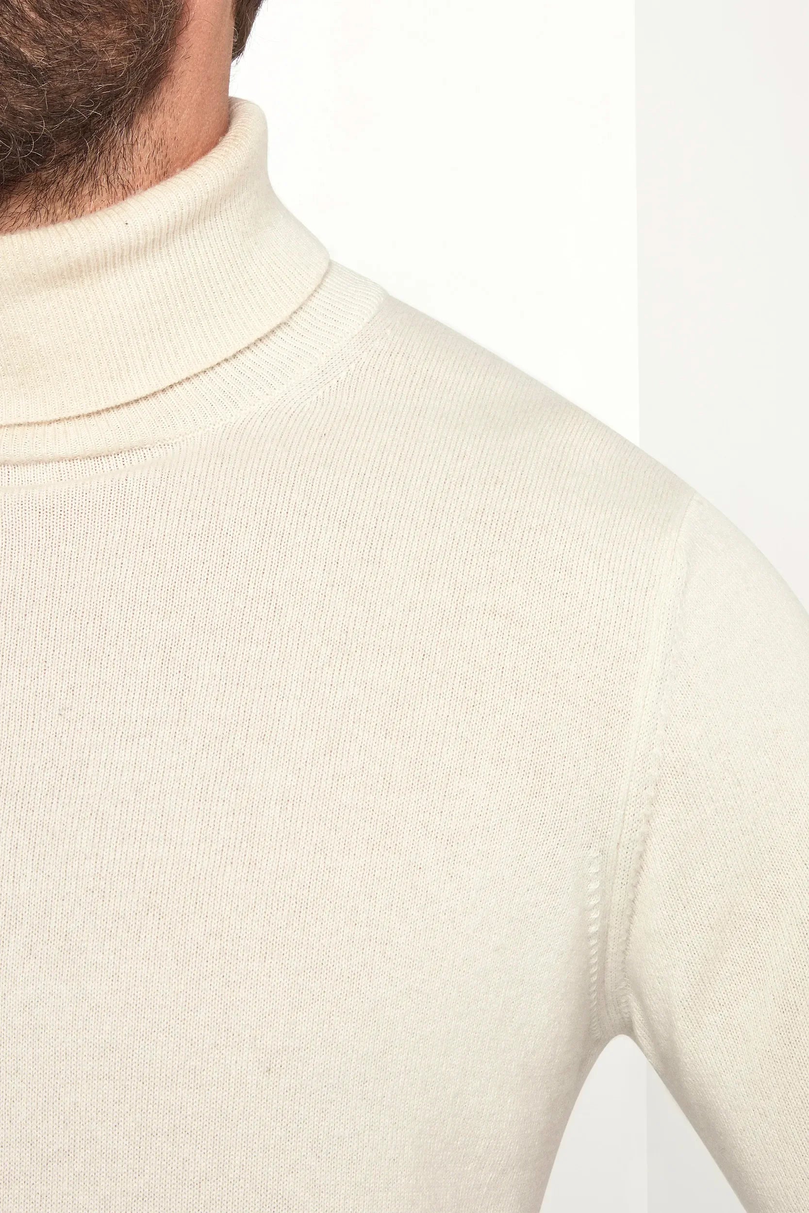 Off-white cashmere turtleneck sweater